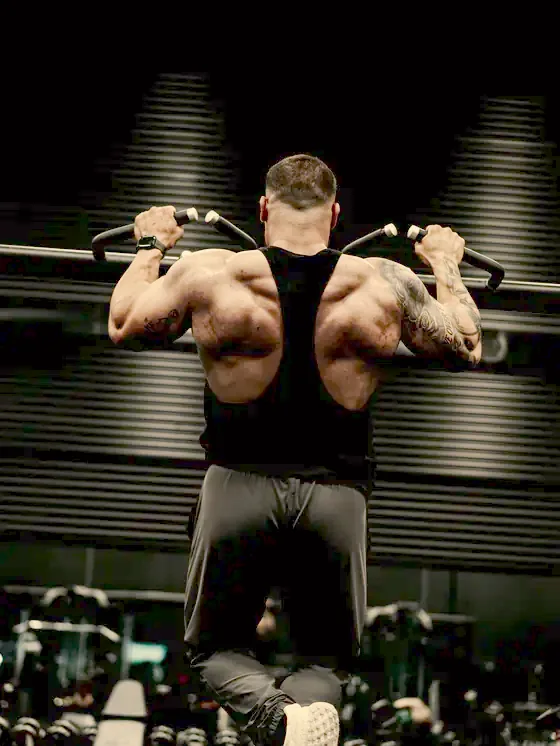 Justin pulling from behind on the lat machine
