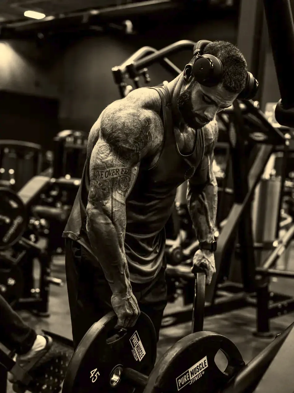 Justin loading plates onto a machine